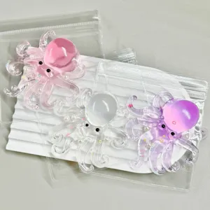 Clear octopus squeeze toy detail shot, cute silicone stress relief toy with pearls and stars inside.