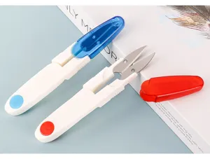 Portable U-shaped yarn scissors with protective cover for embroidery, sewing, and crafts.