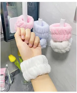 Fleece wrist wash bands for face washing, soft absorbent cuffs to keep arms dry during daily skincare.