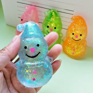 Giocattolo da spremere pupazzo di neve di Natale glitterato, simpatico antistress sensoriale.
