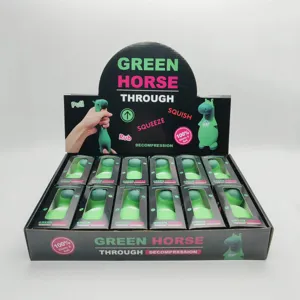 Green horse decompression squeeze toy detail view showing display box packaging and soft design.
