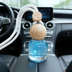 Car interior glass perfume bottle aromatherapy pendant with blue liquid and wood cap fresh air