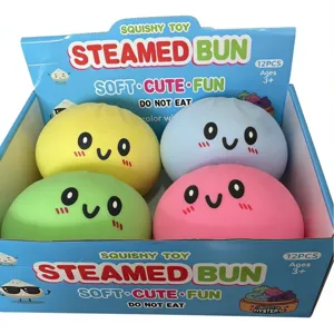 Juguete antiestrés de pan al vapor squishy con bonita cara sonriente para niños.