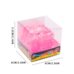 Juguete antiestrés de cubo con purpurina rosa, juguete sensorial fidget en caja transparente.