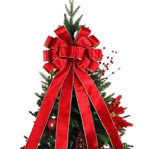 Large red velvet Christmas tree bow with gold trim detailed view, festive holiday decor top.