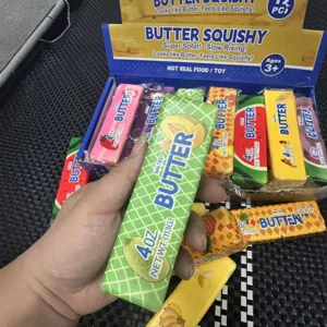 Detail shot of slow rising fruit butter squishy toy with soft texture and realistic packaging design.