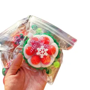 Christmas holiday Christmas decompression squishy toy with strawberry and snowflake design.