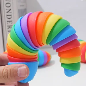 Close-up detail of colorful articulated slug sensory toy, flexible rainbow caterpillar fidget toy design.