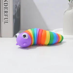 Close-up view of the colorful articulated slug toy in a clean white scene setting.