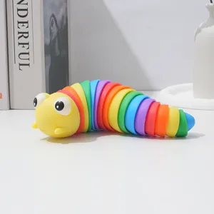 Rainbow articulated slug fidget toy, flexible sensory stress relief caterpillar for desktop play.