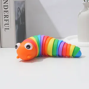 Detailed view of colorful rainbow caterpillar fidget toy, flexible sensory slug for desktop fun.