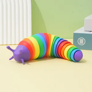 Colorful articulated rainbow slug fidget toy detail, flexible decompression toy for desk.