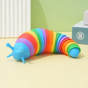 Close-up of the colorful articulated slug fidget toy showing flexible rainbow segments and details.