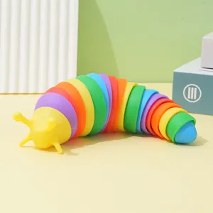 Detail view of the colorful articulated fidget slug toy showing flexible rainbow segments.