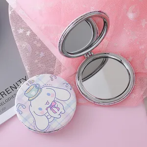 Cute cartoon double-sided folding makeup mirror with lovely character print and portable size.