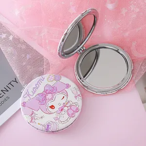Portable foldable double-sided makeup mirror with cute cartoon character pattern for daily use.