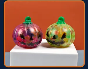 Halloween pumpkin squeeze toy stress relief toy with colorful water beads for fun party.