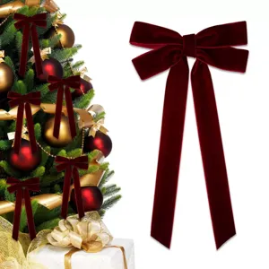 Large red velvet Christmas bow for tree decoration, holiday home party and wedding decor.