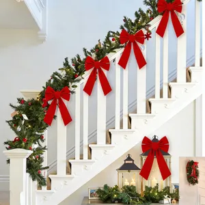 Christmas red velvet bows and green garland staircase decorations for holiday party home decor