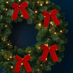 Red velvet Christmas bows with gold wire, perfect for holiday tree and wreath decoration.