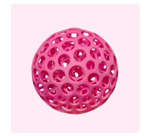 Close-up detail of the pink 3D printed lattice hallow stress ball with flexible structure.