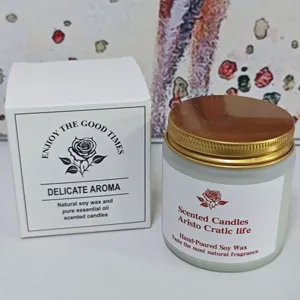 Soy wax scented candle in glass jar with gift box for home fragrance and relaxation decor.