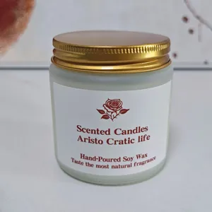 Exquisite scented candle in frosted glass jar with gold lid, soy wax for home fragrance.