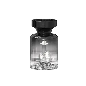 Black car aromatherapy diffuser glass bottle featuring mountain landscape and air freshener