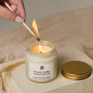 Scented soy wax candle in glass jar with metal lid, ideal for home bedroom relaxation and decor.