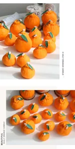 Candela profumata a forma di mandarino dolce, perfetta decorazione domestica e regalo rilassante.