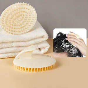 Brosse de massage du cuir chevelu en silicone pour le lavage des cheveux et détente relaxante.