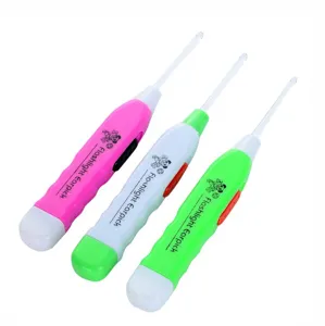 LED lighted ear pick clean tool with non-slip handle and safe transparent spoon tip.