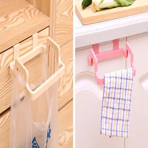 Kitchen cabinet door hanging trash bag holder plastic storage organizer shelf unit.