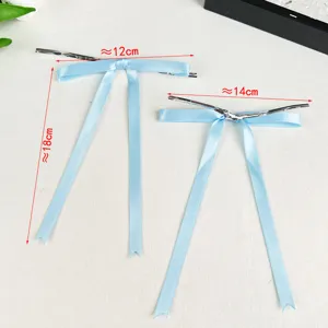 Light blue ribbon bow with long tail and wire tie for DIY holiday tree wreath decoration