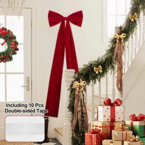 Extra large red velvet Christmas bow detail showing long streamers and tape accessories