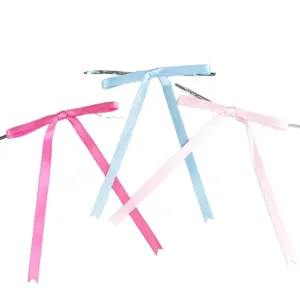 Satin ribbon bow twist ties with long tails for DIY holiday decor, Christmas tree and wreaths.