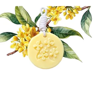 Round scented wax tablet with white hanging cord and osmanthus flower embossing for home decor