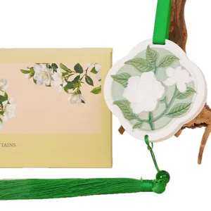 Chinese style gardenia scented hanging ornament with green tassel for car home wardrobe decor.