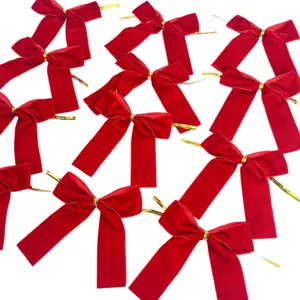 Red velvet Christmas tree bows, decorative gift wrapping bows for holiday home decor.