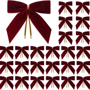 Dunkelrote Samt Weihnachtsschleifen mit Goldbändern, ideal für Baumdekoration.