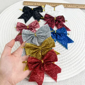 Fiocco glitterato decorazione per albero di Natale ornamento festivo colorato vista dettaglio