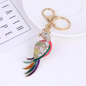 Exquisite rhinestone parrot keychain bag charm, detailed metal design with colorful crystals.