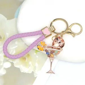 Exquisite rhinestone cat's eye metal wine glass keychain, detailed view of sparkling crystal pendants.