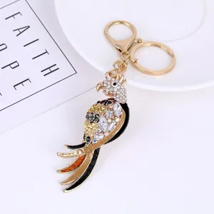 Crystal rhinestone parrot keychain detail, cute metal bird bag pendant and car keyring ornament.