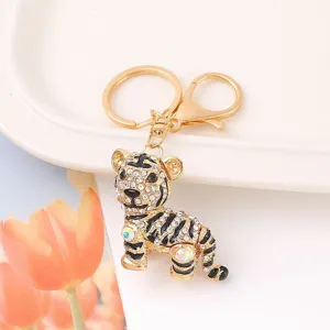 Close-up detail view of the sparkling rhinestone tiger keychain with secure clasp and ring.