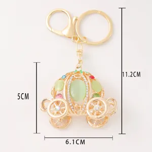 Fashion rhinestone pumpkin carriage keychain gold metal cat eye stone bag pendant key chain