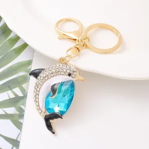 Dolphin rhinestone keychain with blue crystal, cute metal ring pendant for bags and car keys.