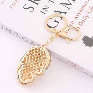 Exquis porte-clés crâne en strass pendentif en métal accessoire de sac élégant et cadeau