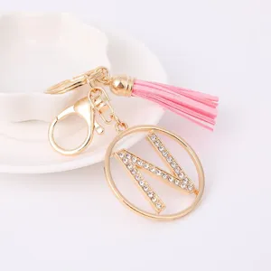 Metal rhinestone letter pink tassel keychain bag charm for fashion women daily gift.