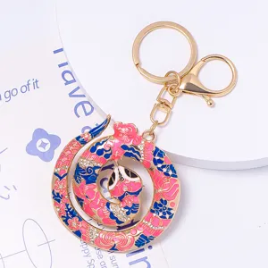 Chinese style painted zodiac snake keychain, elegant metal enamel bag charm and cute keyring.
